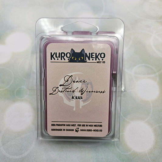 A set of wax melts in a clamshell on light green background with white circles.  The pictured scent is Dance, Destined Weaveress: Aglaea.
