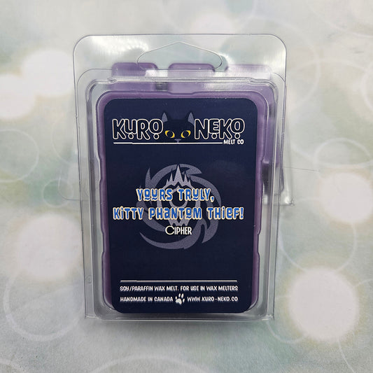 A set of wax melts in a clamshell on light green background with white circles.  The pictured scent is Yours Truly, Kitty Phantom Thief!: Cipher.
